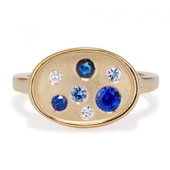 sapphire and diamond galaxy ring yellow gold